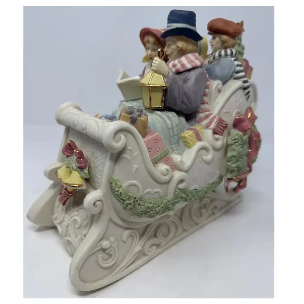 Timeless Inspirations Radiance Collection Musical Carollers in Sleigh Gifts Tree